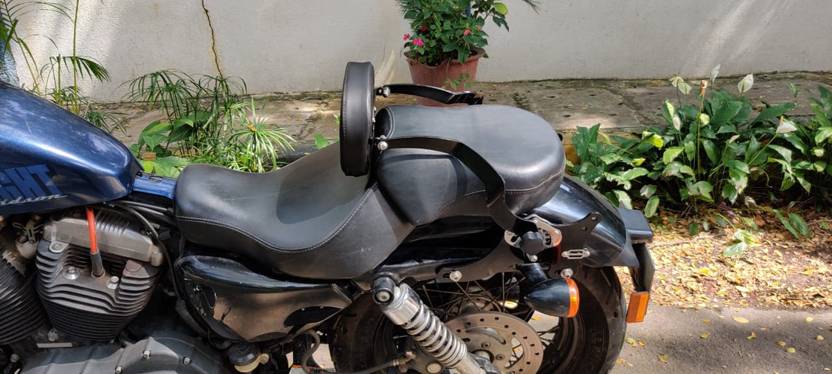 Motorcycle backrest shown in rider mode and pillion mode