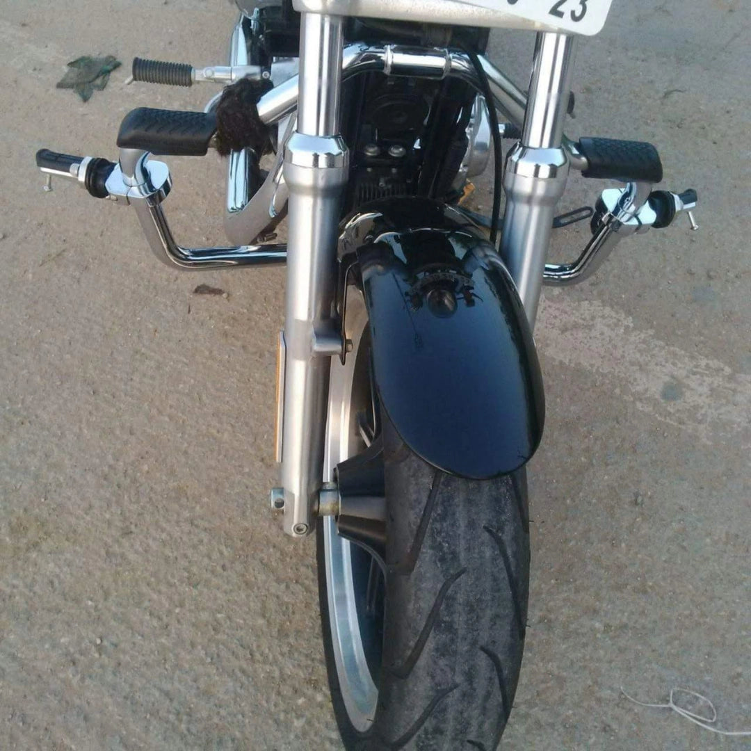 Front view of a motorcycle showing the highway footpeg mounting positions