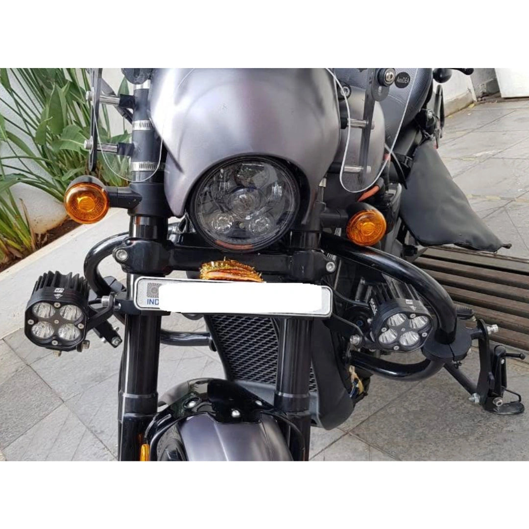 Front view of motorcycle showing adjustable highway footpegs mounted on the engine guard