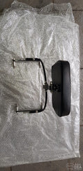 Adjustable motorcycle backrest with curved support rod and mounting brackets laid out separately