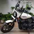 White motorcycle fitted with AeeDEA adjustable polycarbonate windshield
