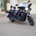 Motorcycle showing the installed Batwing fairing and windshield from the side
