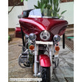 Close-up of red motorcycle showing the Batwing fairing and front bodywork