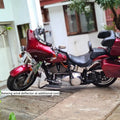 Red motorcycle fitted with an AeeDEA Batwing fairing