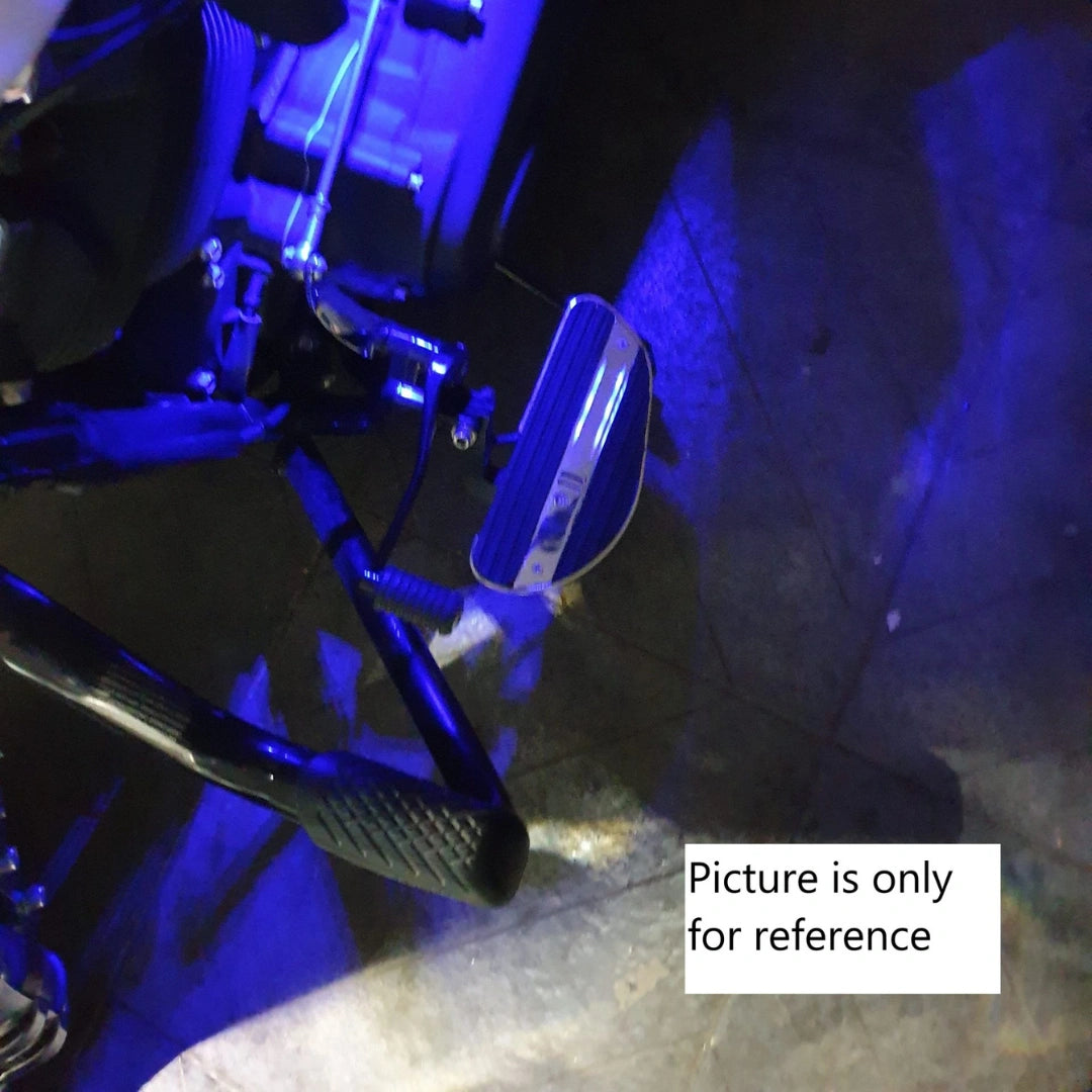 Close-up of blue LED illumination around a motorcycle footboard