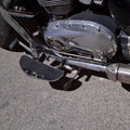 Side view of motorcycle showing its forward control footboard arrangement