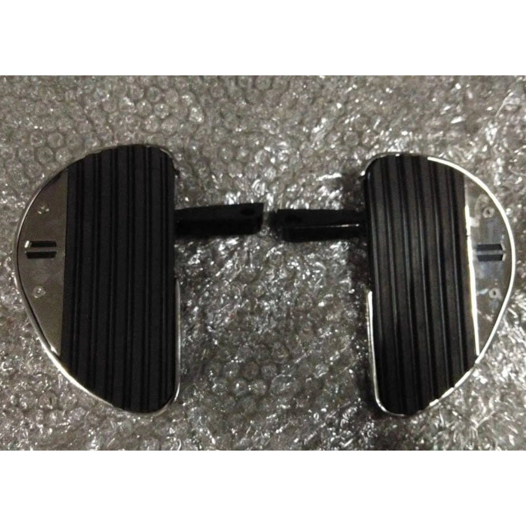 Close-up of AeeDEA motorcycle pillion footboards installed beside the engine