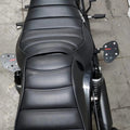Top view showing the position of rider footboards beside the motorcycle seat