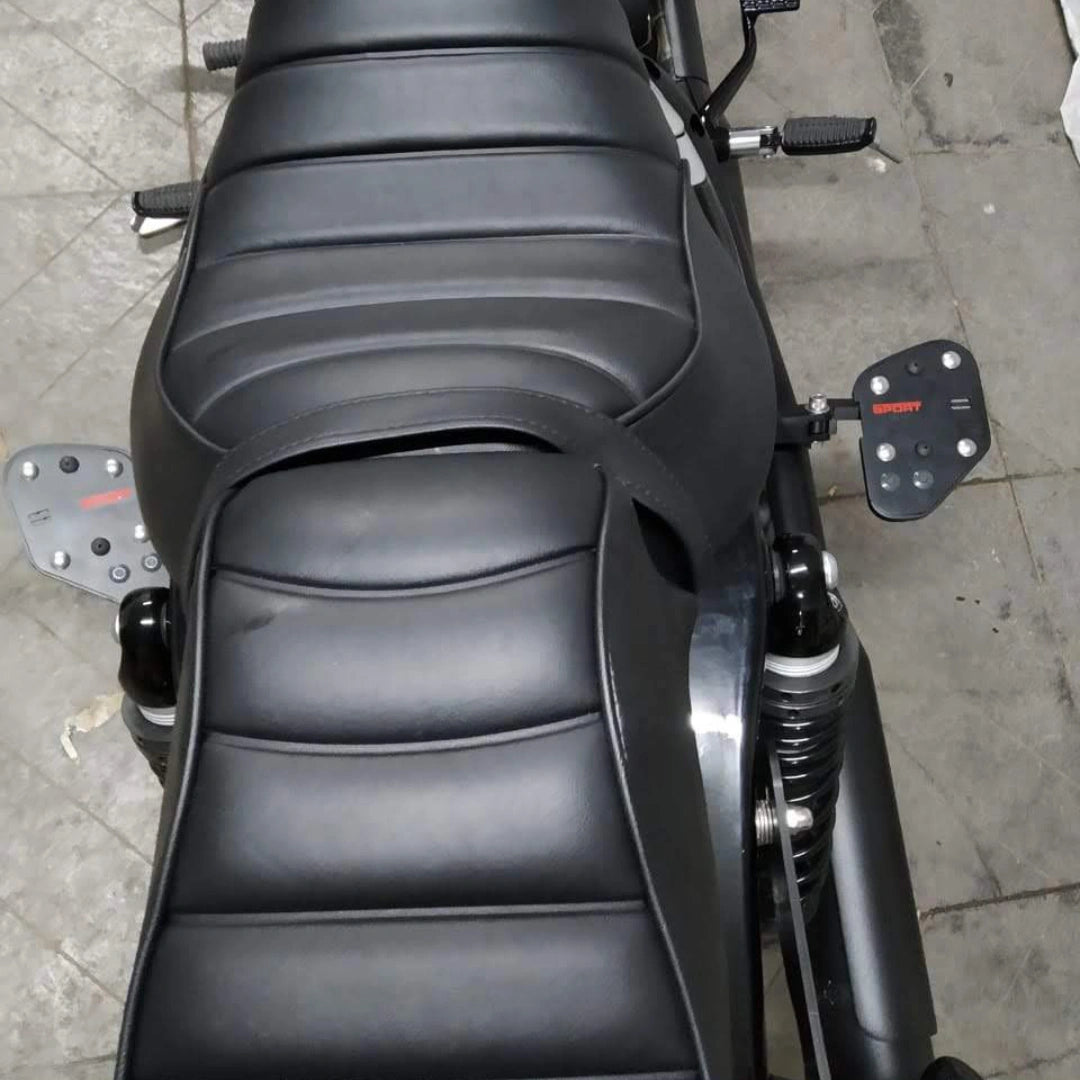 Top view showing the position of rider footboards beside the motorcycle seat
