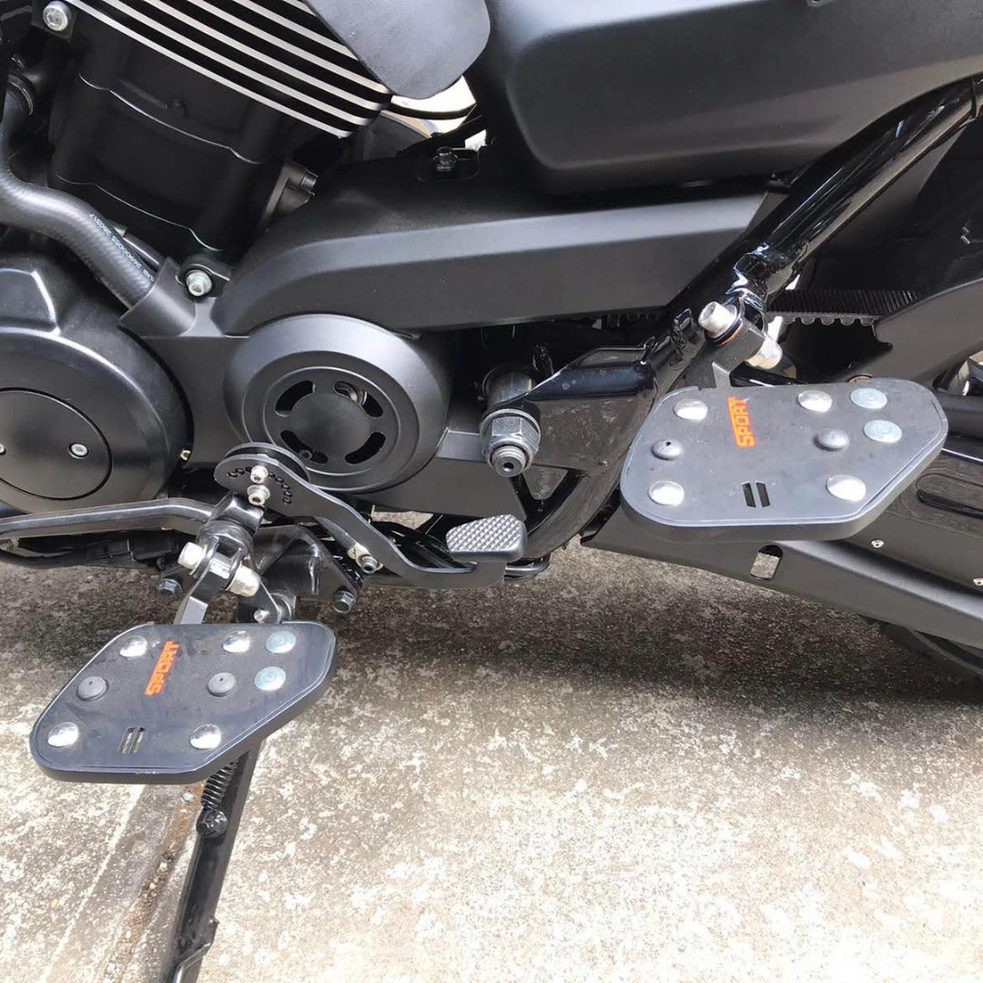Side view of AeeDEA Sports footboards fitted in the motorcycle's mid-mount position