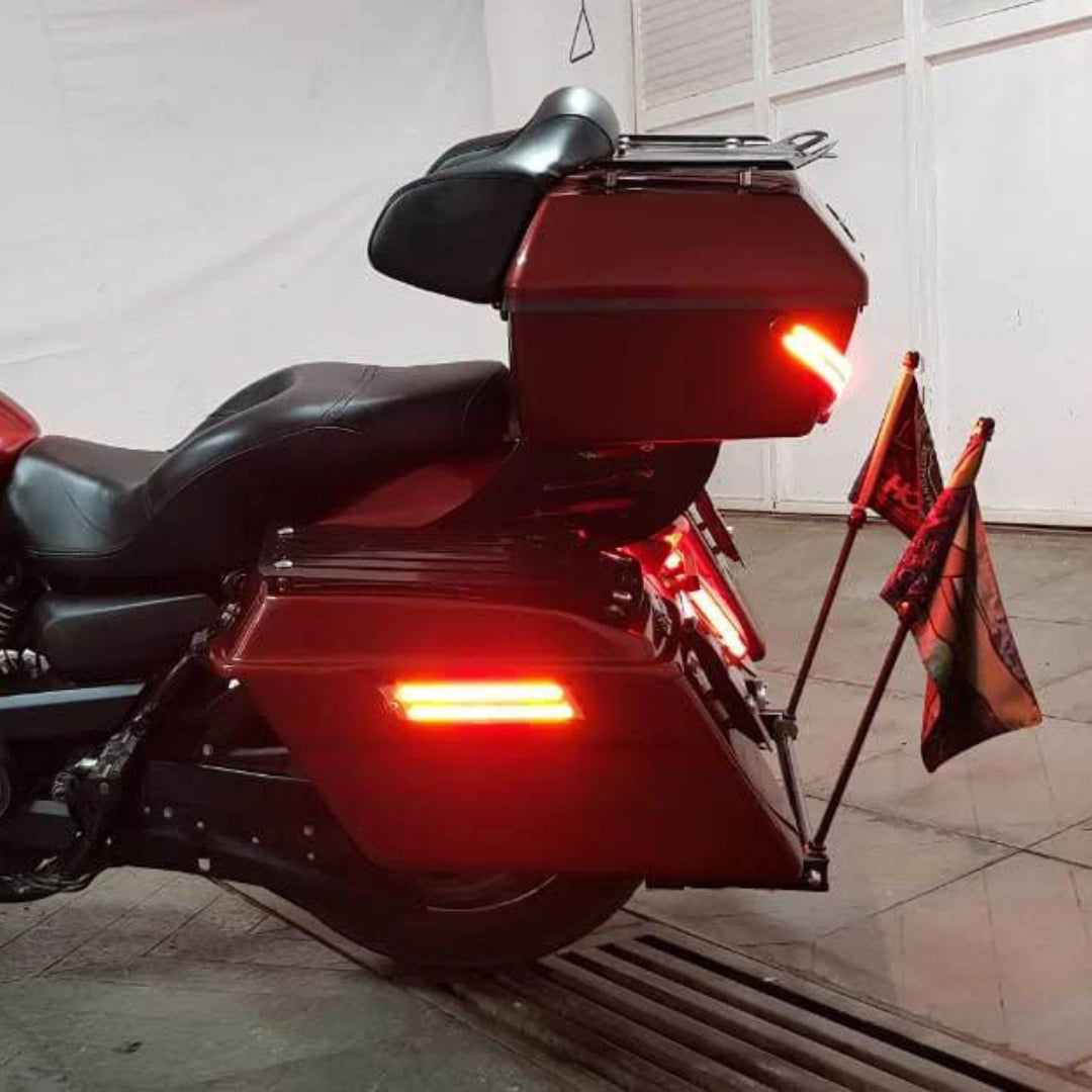 Rear view of touring panniers showing illuminated integrated LED lights