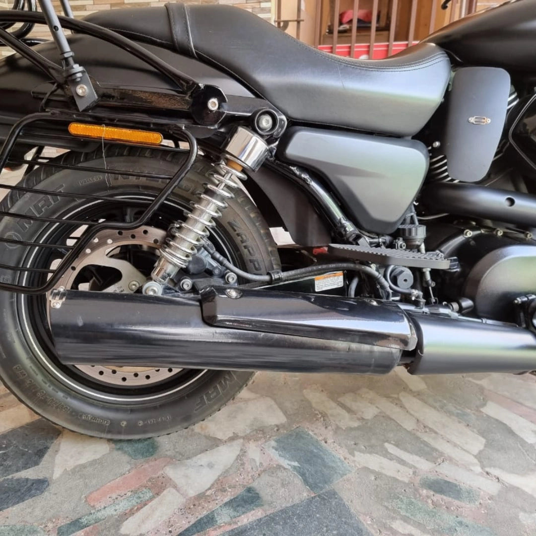 Side view of the motorcycle showing the AeeDEA exhaust installed below the rear footpeg