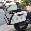 White motorcycle fitted with matching white touring side panniers