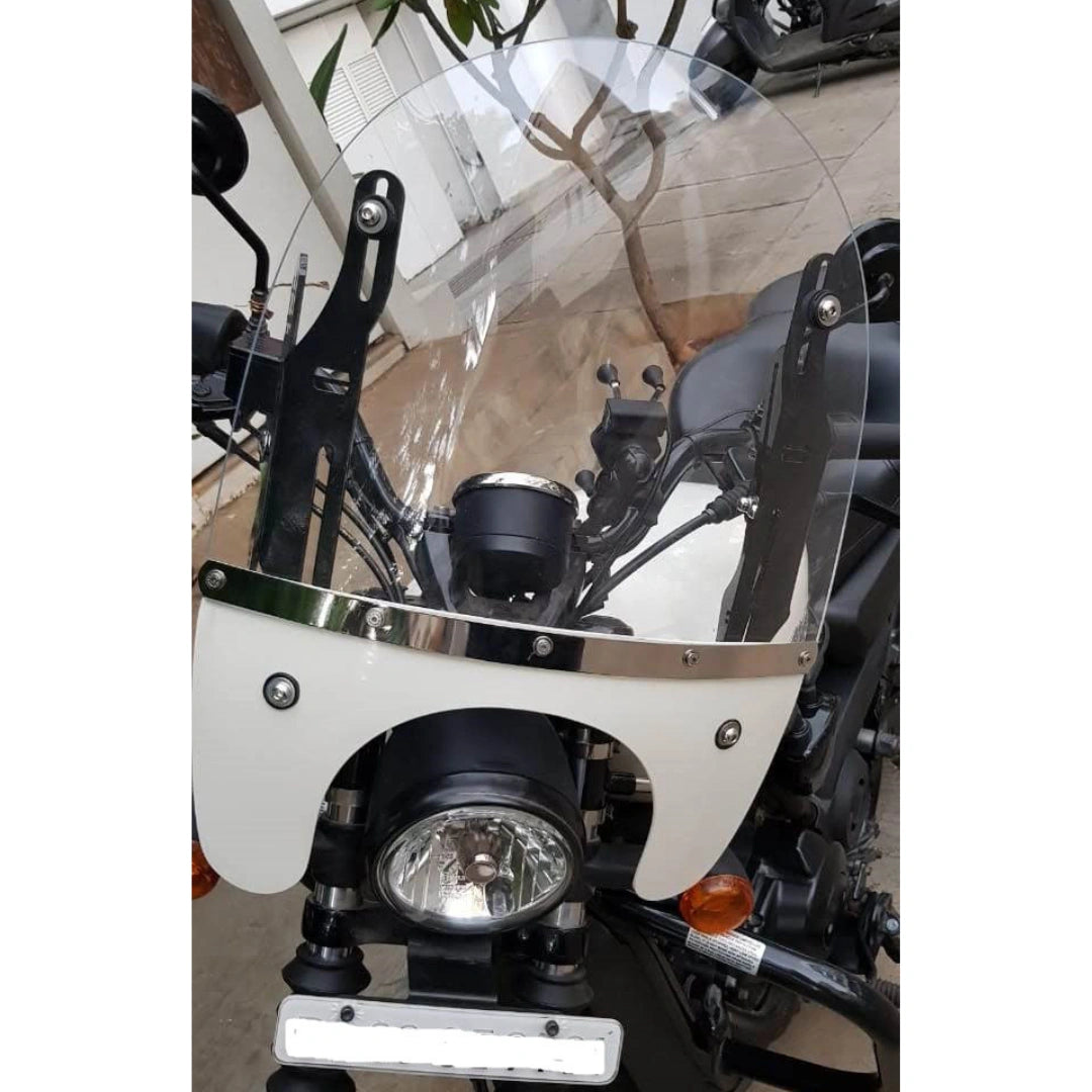 Close-up of motorcycle windshield mounted above the headlight and cowl