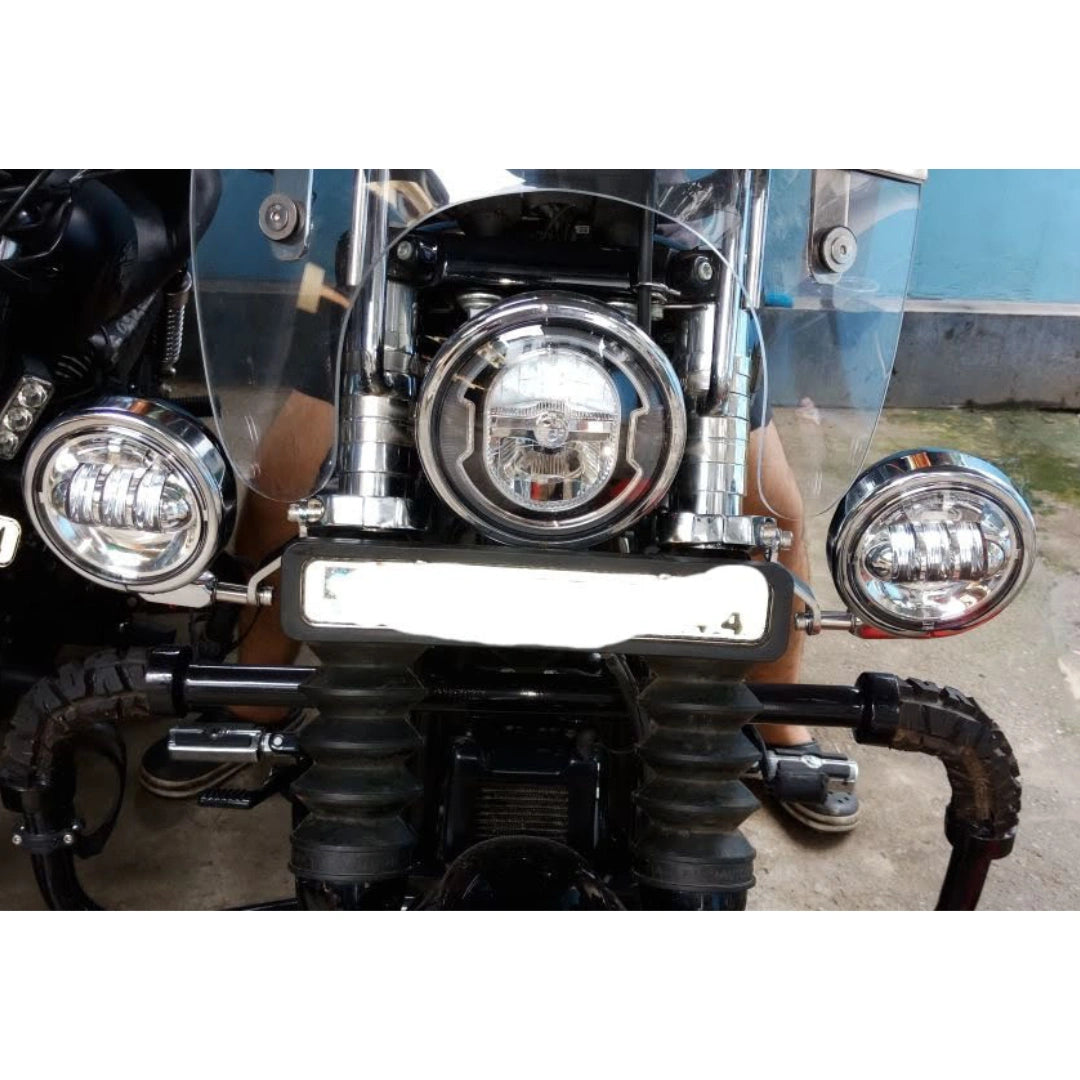 Close-up of an auxiliary light and its adjustable mounting bracket