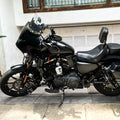 Motorcycle fitted with Batwing fairing photographed from the front side