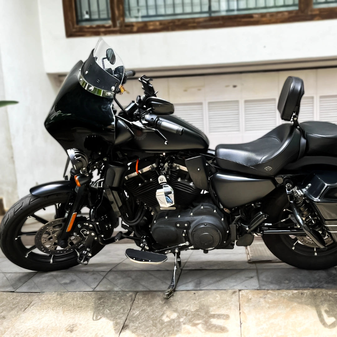 Motorcycle fitted with Batwing fairing photographed from the front side