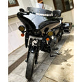 Motorcycle fitted with Batwing fairing photographed from the front side