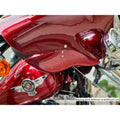 Close-up of red motorcycle bodywork and Batwing fairing installation
