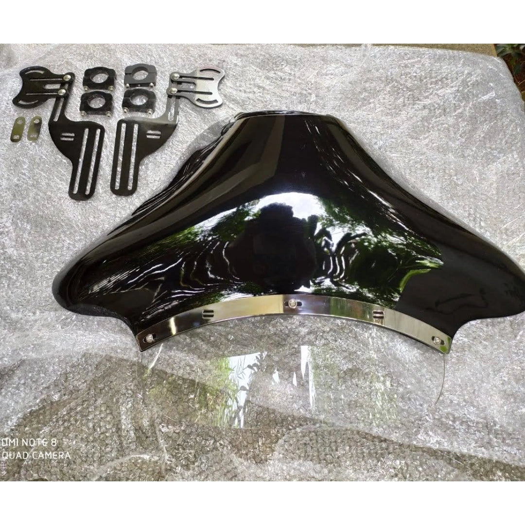 Close-up of the curved acrylic windshield and its finish