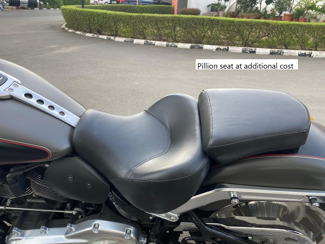 Deep-resting motorcycle seat and separate pillion seat fitted to a cruiser motorcycle; pillion seat available at additional cost