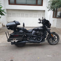 Deep resting motorcycle seat with a large rider backrest