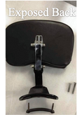 Rear of a motorcycle backrest pad showing the exposed mounting bracket and adjustment hardware