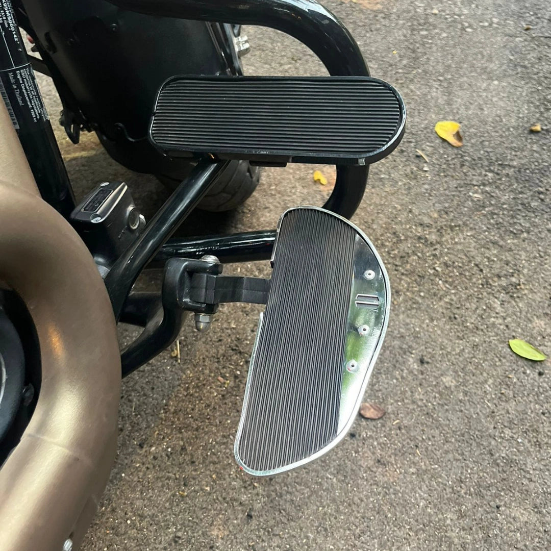 Front view of motorcycle showing the forward control setup