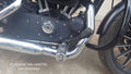 Motorcycle forward foot controls showing the gear linkage and extended mounting position