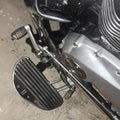 Close-up of the lower mounting area of a motorcycle forward control footboard