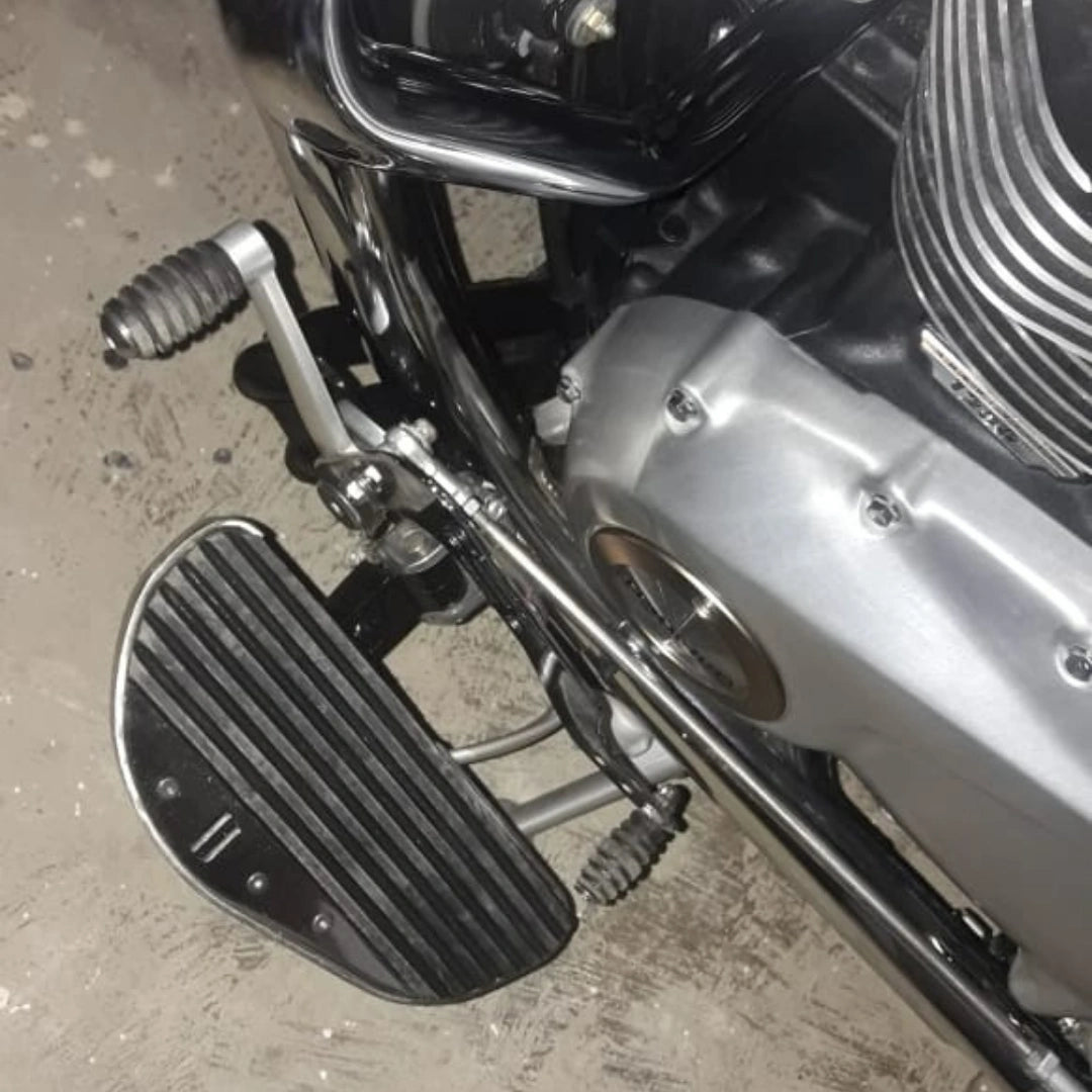 Close-up of the lower mounting area of a motorcycle forward control footboard