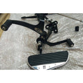 Side view of a motorcycle forward control footboard and its mounting bracket