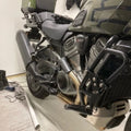 AeeDEA extended reach footpeg installed on a Harley-Davidson motorcycle