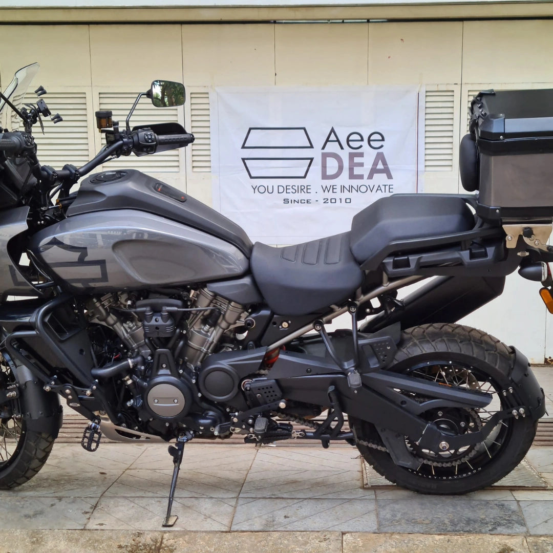 AeeDEA extended reach footpegs installed on a Harley-Davidson motorcycle