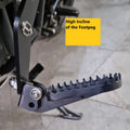 AeeDEA extended reach footpeg shown with a high footpeg incline