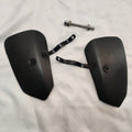 Pair of black heat deflector shields with mounting brackets and hardware