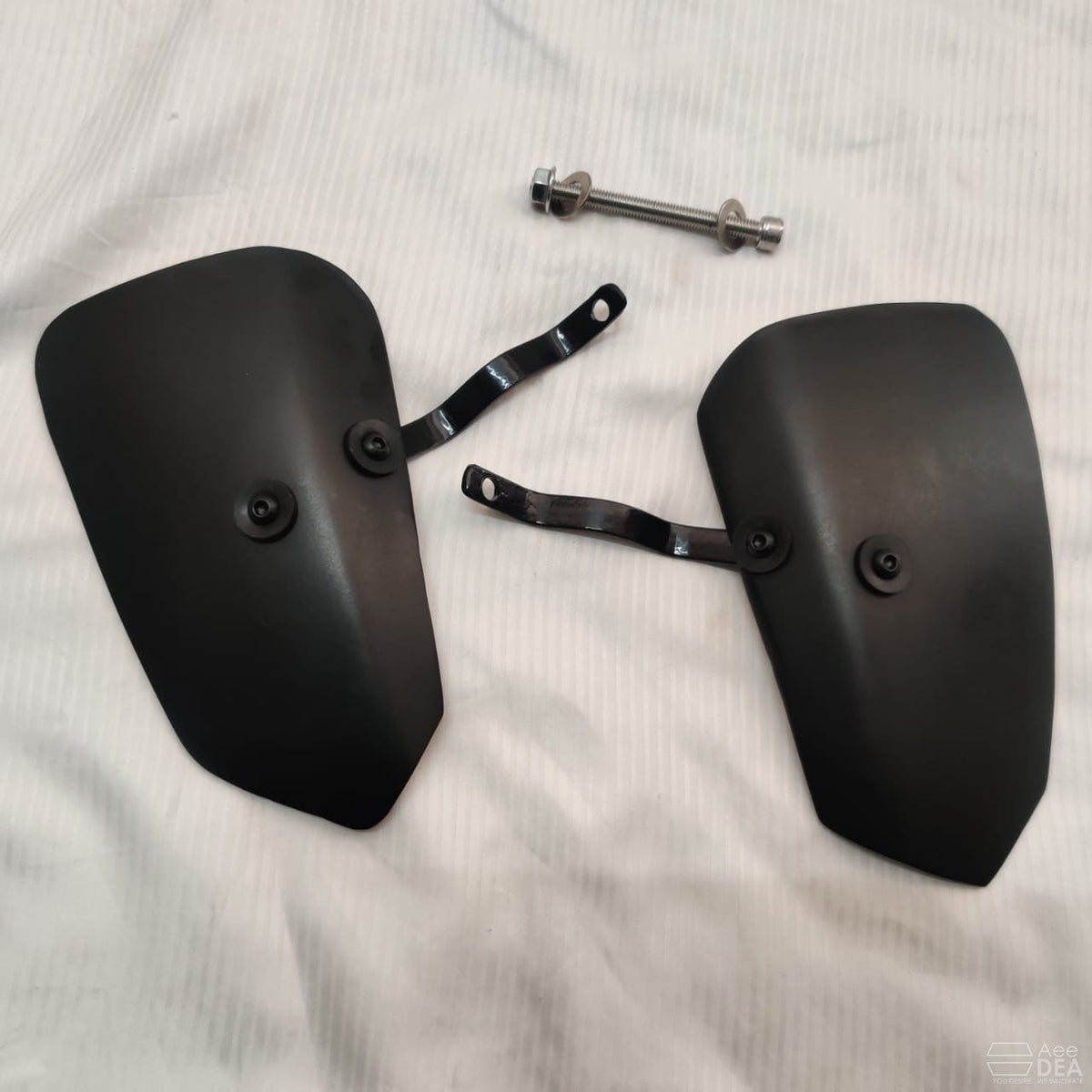 Pair of black heat deflector shields with mounting brackets and hardware