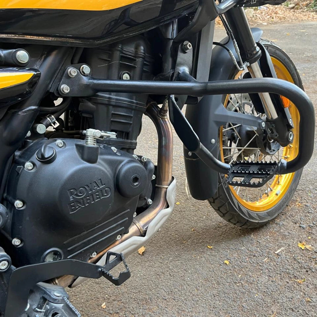 Close-up of AeeDEA front crash guard with integrated highway footpeg installed on Royal Enfield Himalayan 450