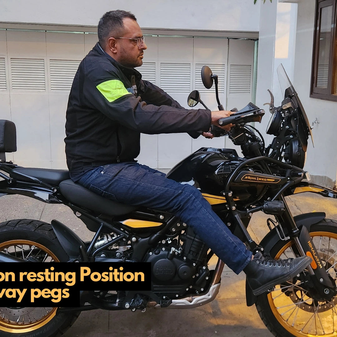 Rider using AeeDEA highway footpegs in an extended leg position on Royal Enfield Himalayan 450
