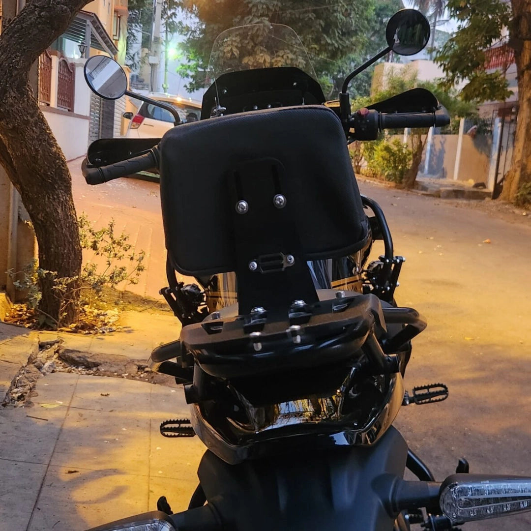 Rear close-up of AeeDEA pillion backrest cushion and mounting bracket on Himalayan 450