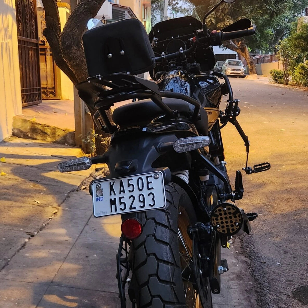 AeeDEA pillion backrest with luggage rack installed on Royal Enfield Himalayan 450, rear view