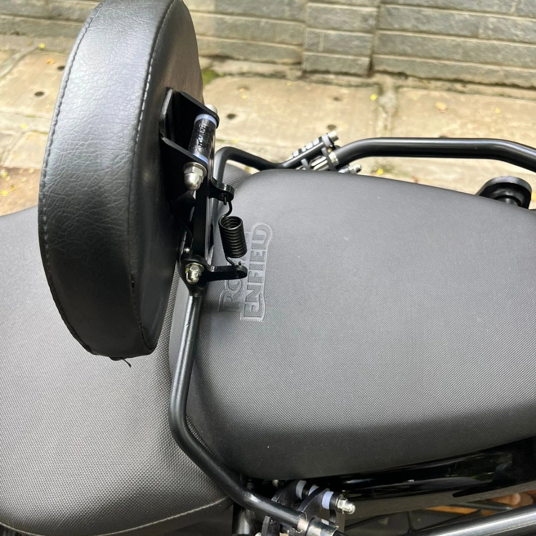 Close-up of the adjustable mounting bracket and spring mechanism on AeeDEA rider backrest