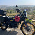 AeeDEA soft bag and jerry can holder mounted on Royal Enfield Himalayan 450 with a red fuel can