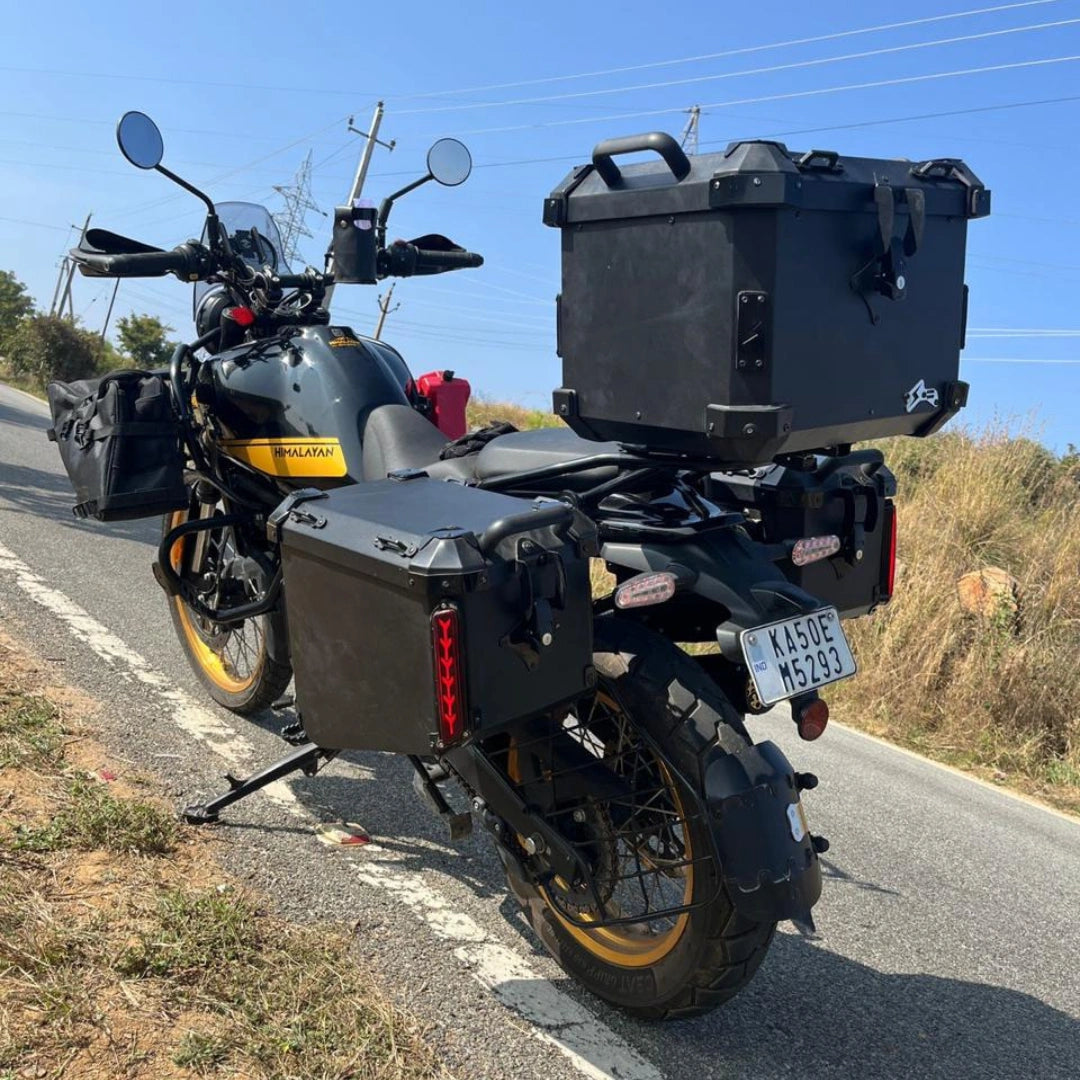 Rear view of AeeDEA luggage setup on Royal Enfield Himalayan 450 with side panniers, top box and jerry can holder