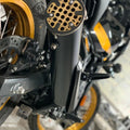 Detailed view of the AeeDEA exhaust end cap and mounting area on Royal Enfield Himalayan 450