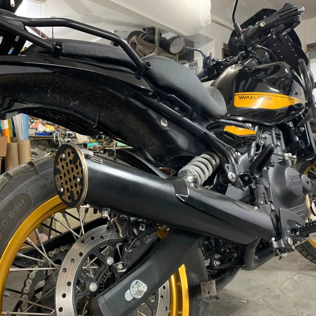 Side view of AeeDEA black variable sound exhaust installed on Royal Enfield Himalayan 450
