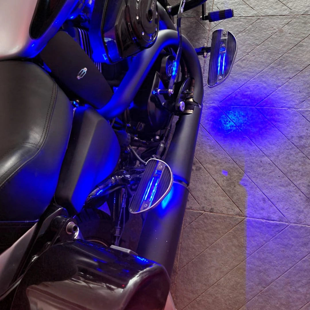 Top view of motorcycle seat with illuminated LED pillion footboards on both sides