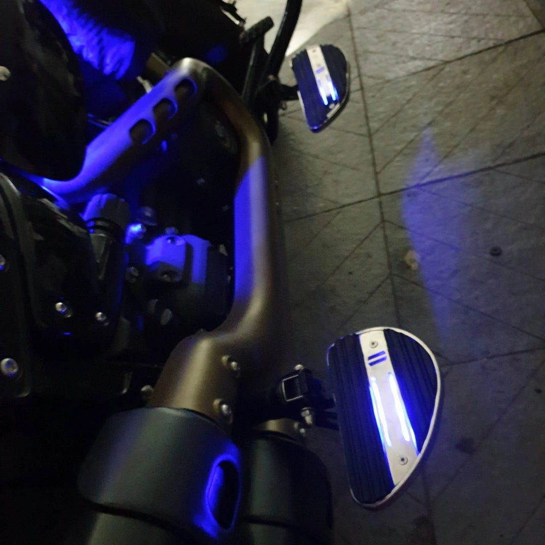 Close-up of blue LED illumination around the motorcycle passenger footboard