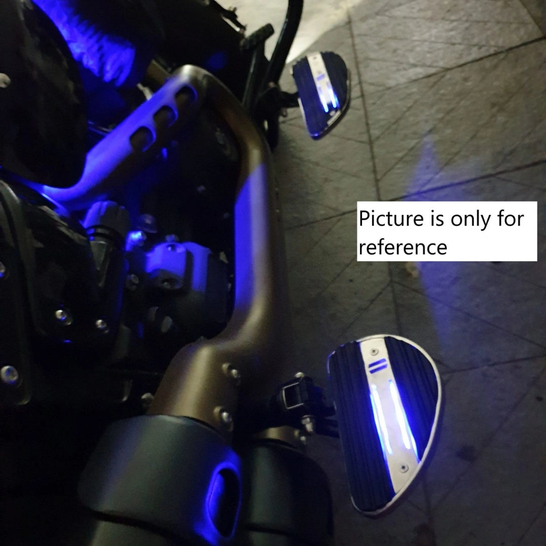 Close-up of blue illumination from an LED motorcycle rider footboard
