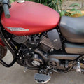 AeeDEA rider footboard shown installed below the motorcycle fuel tank